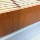 Double bed vintage Scandinavian in teak from the 1960s with integrated bedside tables.