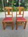 Pair of Art Deco chairs in solid oak and burgundy leather from around 1940.