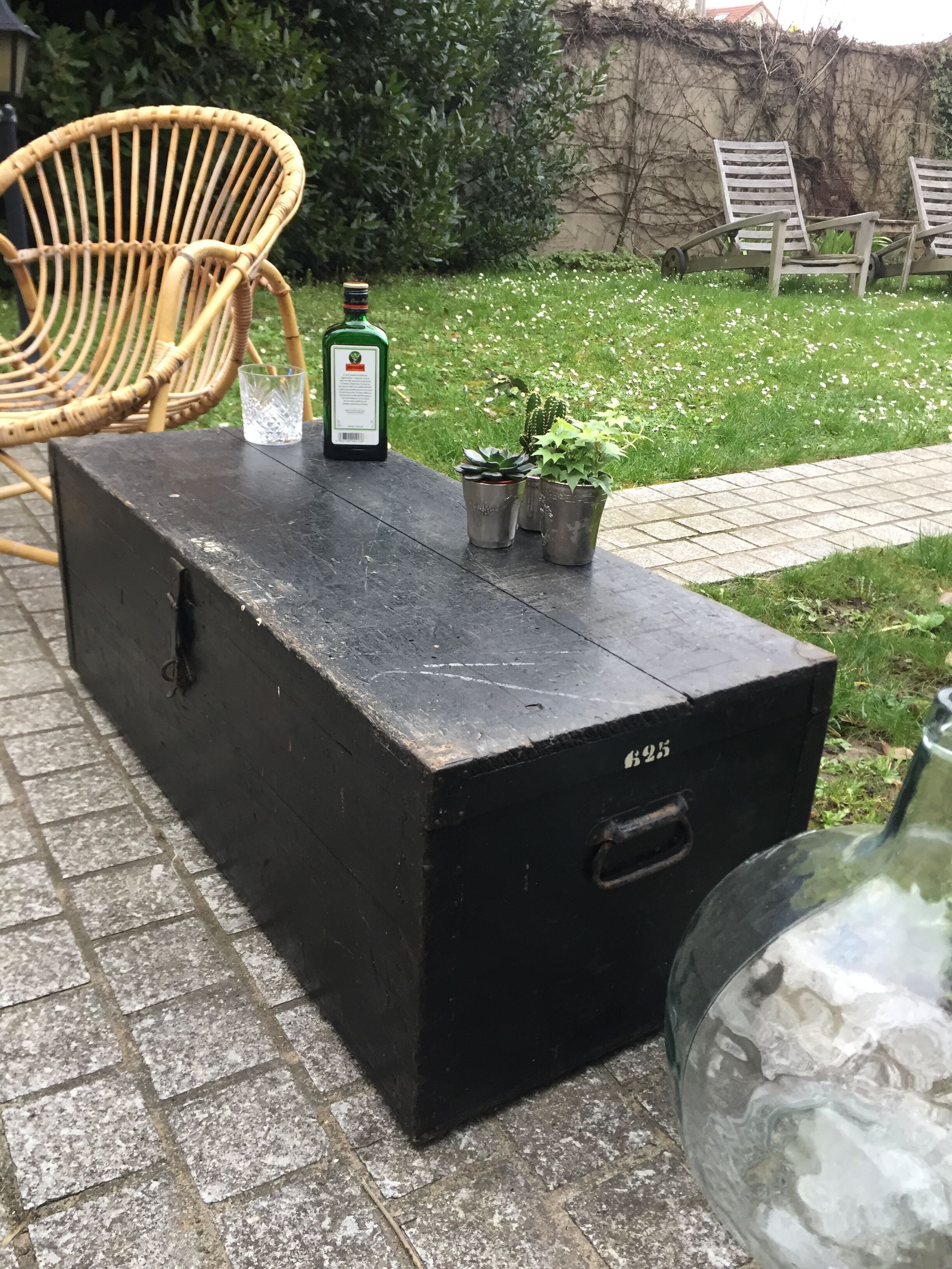 Old chest or wooden trunk black patina