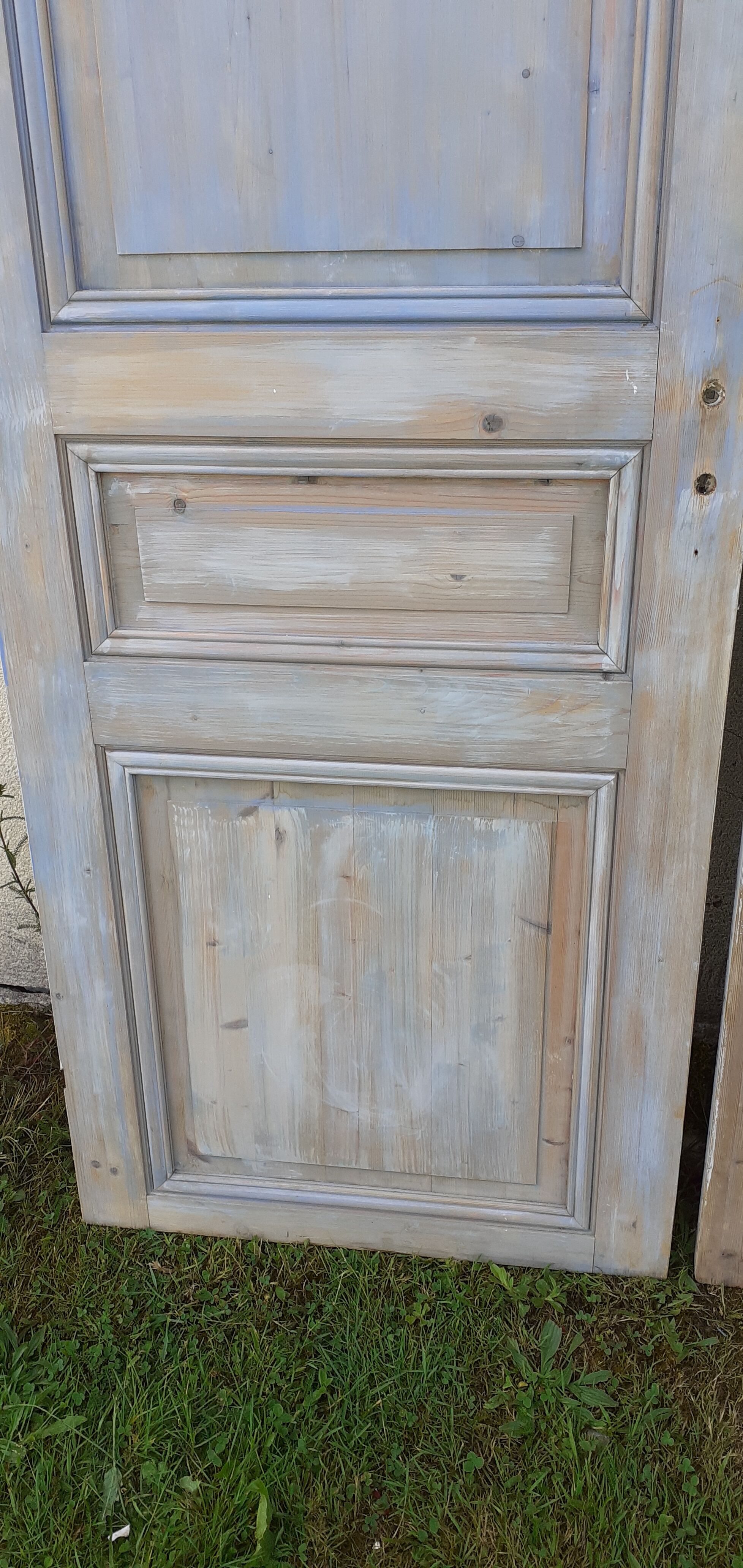 Pairs of Haussmannian doors in patinated aged wood
