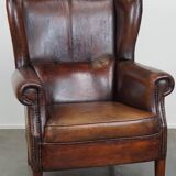 Large Sheepskin Leather Wingback Armchair with a Fixed Seat Cushion and a Stunning Patina