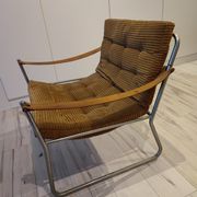 Scandinavian living room armchair in tubular chrome and leather