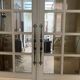 Double separation doors with transom and beveled glass 20th century