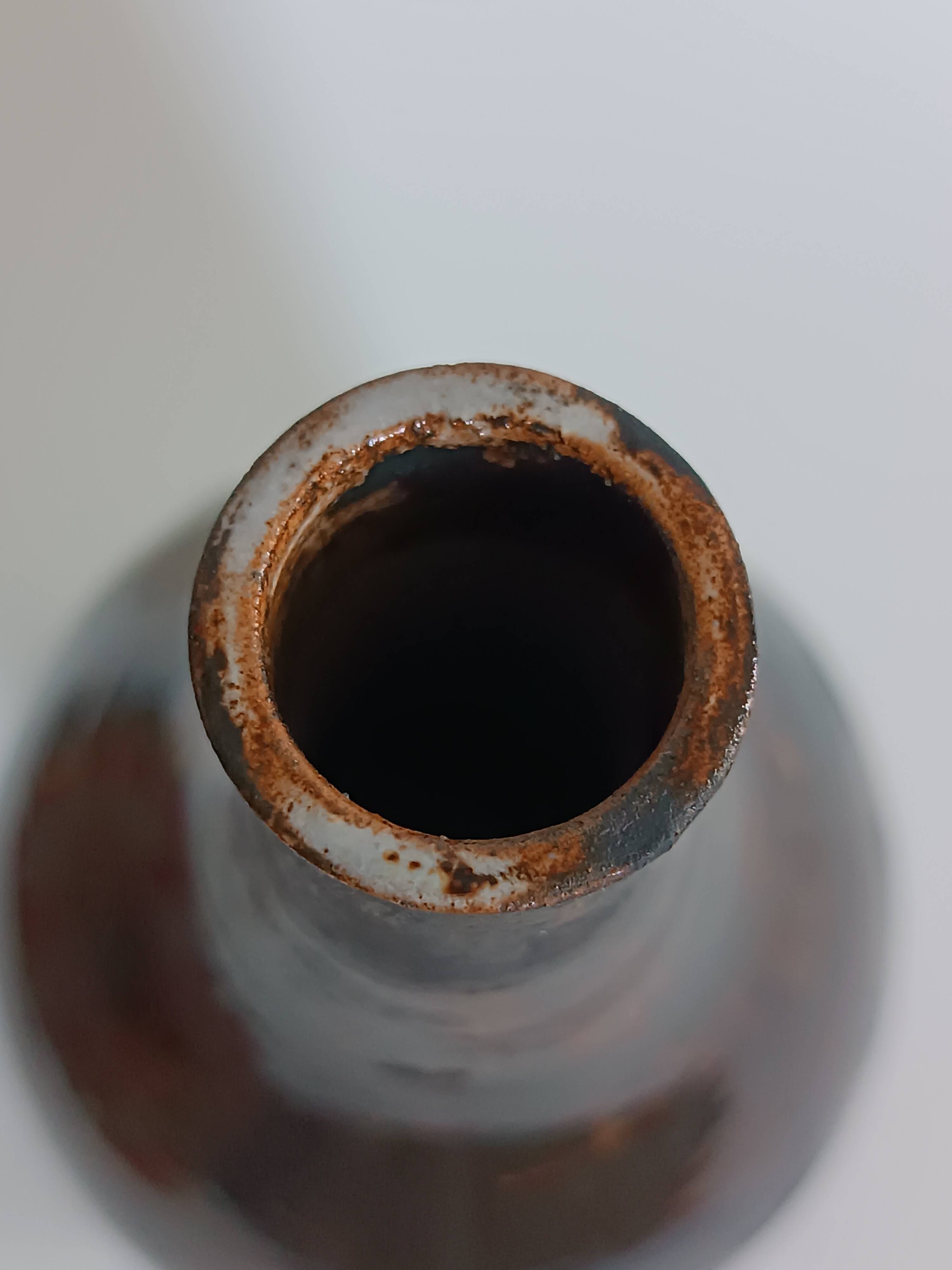 A bottle and six ceramic cups by Gérard Hofmann Vallauris 1950.