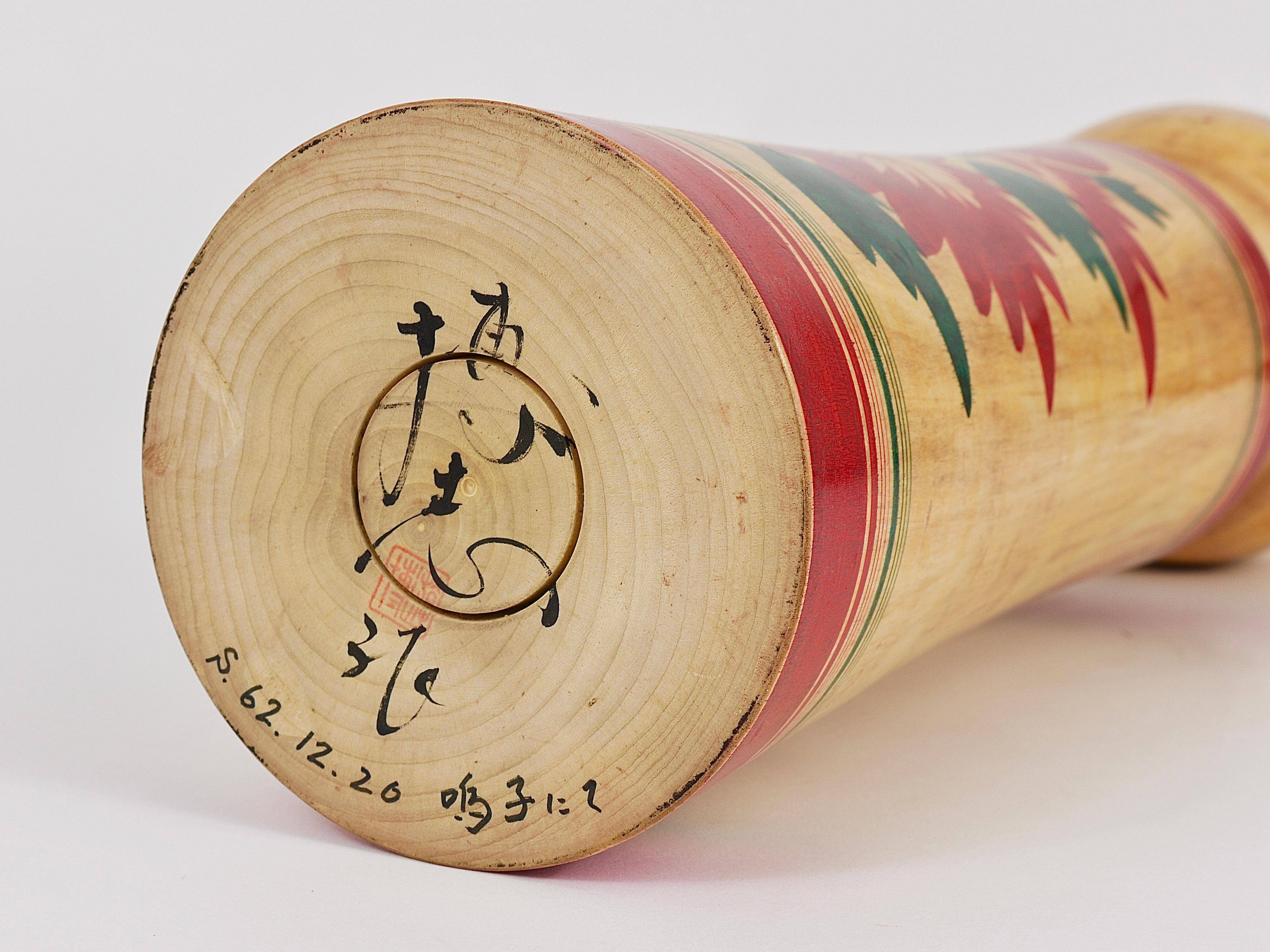 Decorative Kokeshi doll sculpture from Naruko, northern Japan, hand-painted.