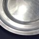 Circular silver-plated metal dish signed ercuis