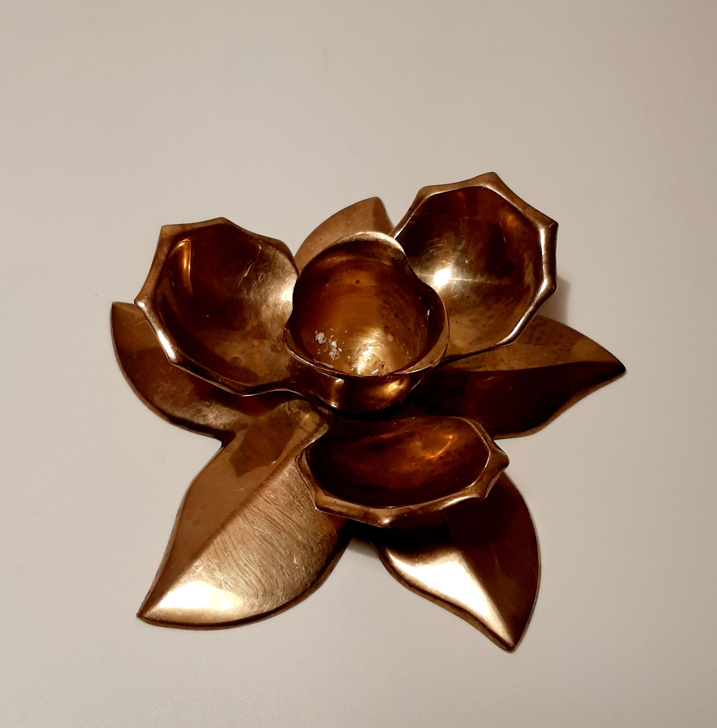 Golden brass flower candle holder