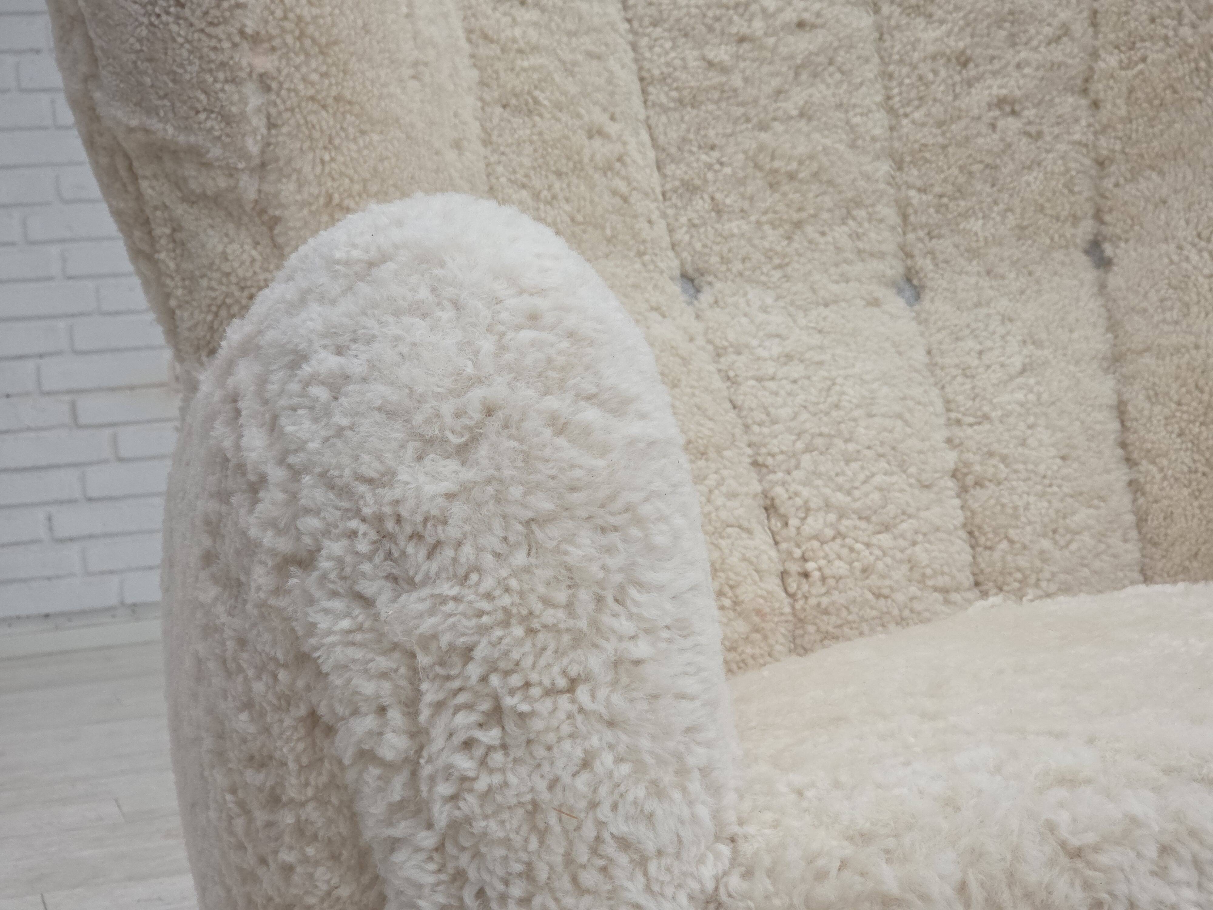 1960s, Danish design, reupholstered highback armchair, genuine sheepskin.