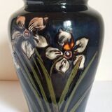 Old enameled earthenware vase with daffodils early 20th century