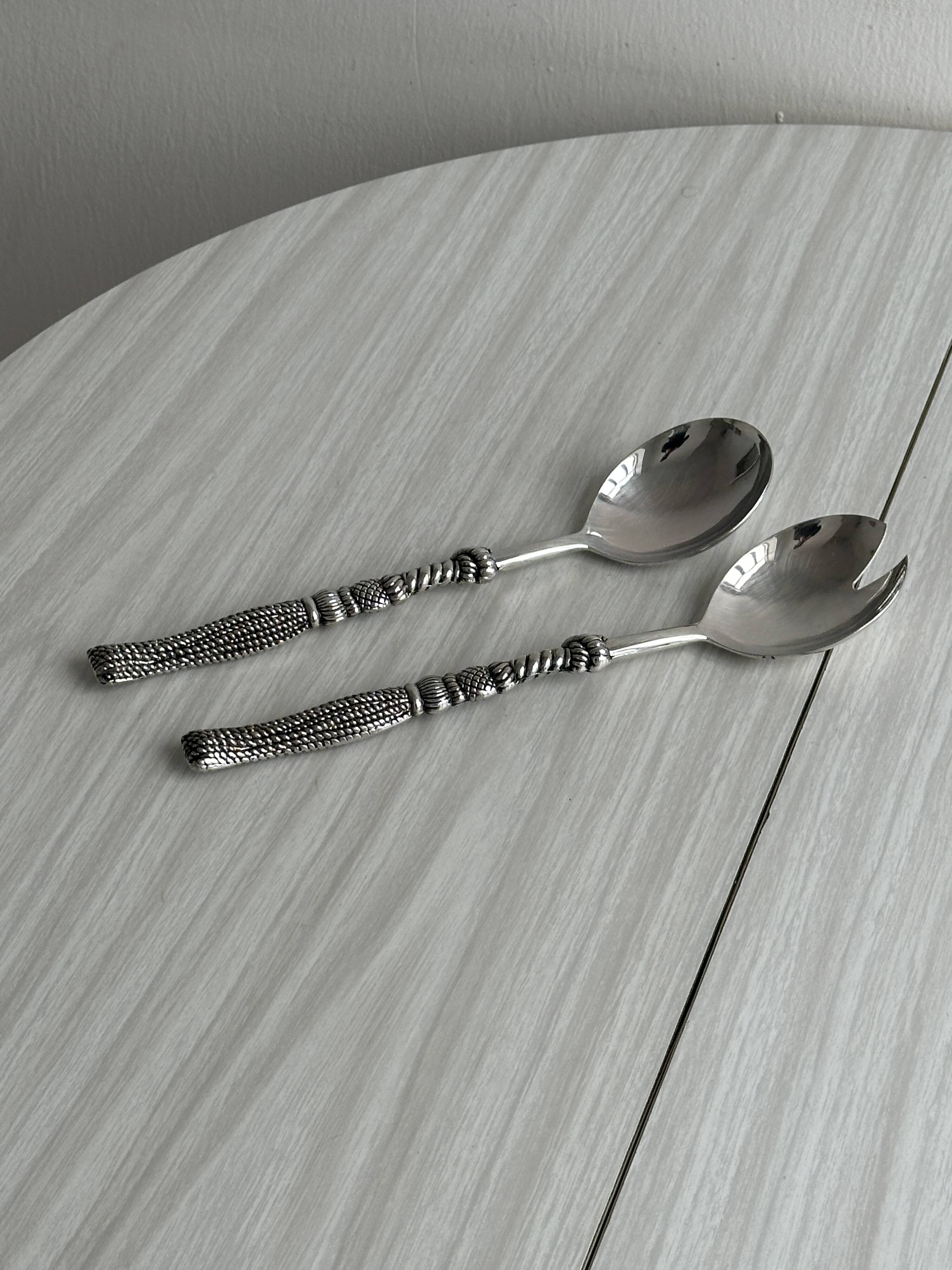 Metal serving utensils