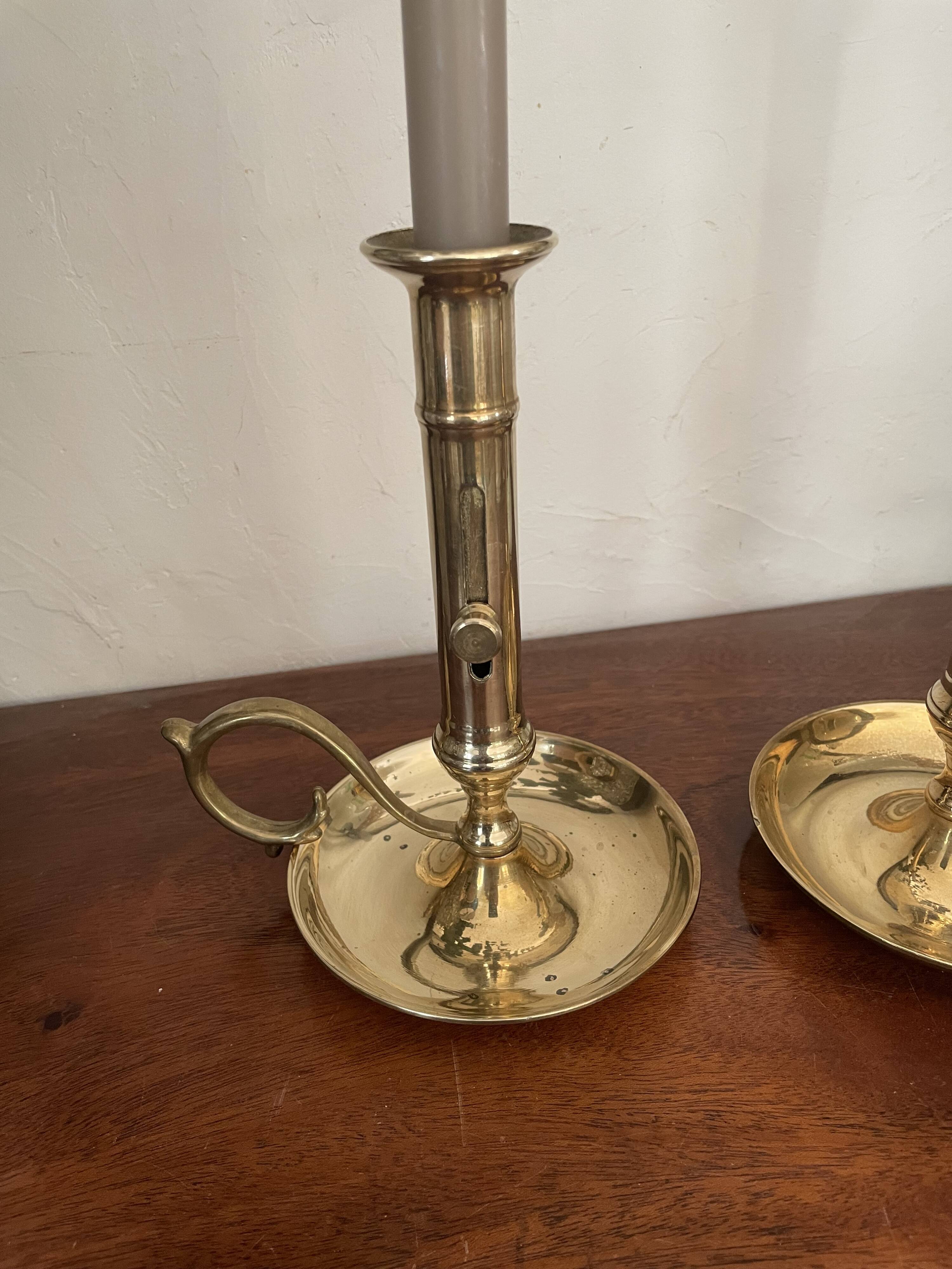 Pair of brass candle holders
