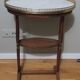 Saddle pedestal table with marble top in Louis XV style