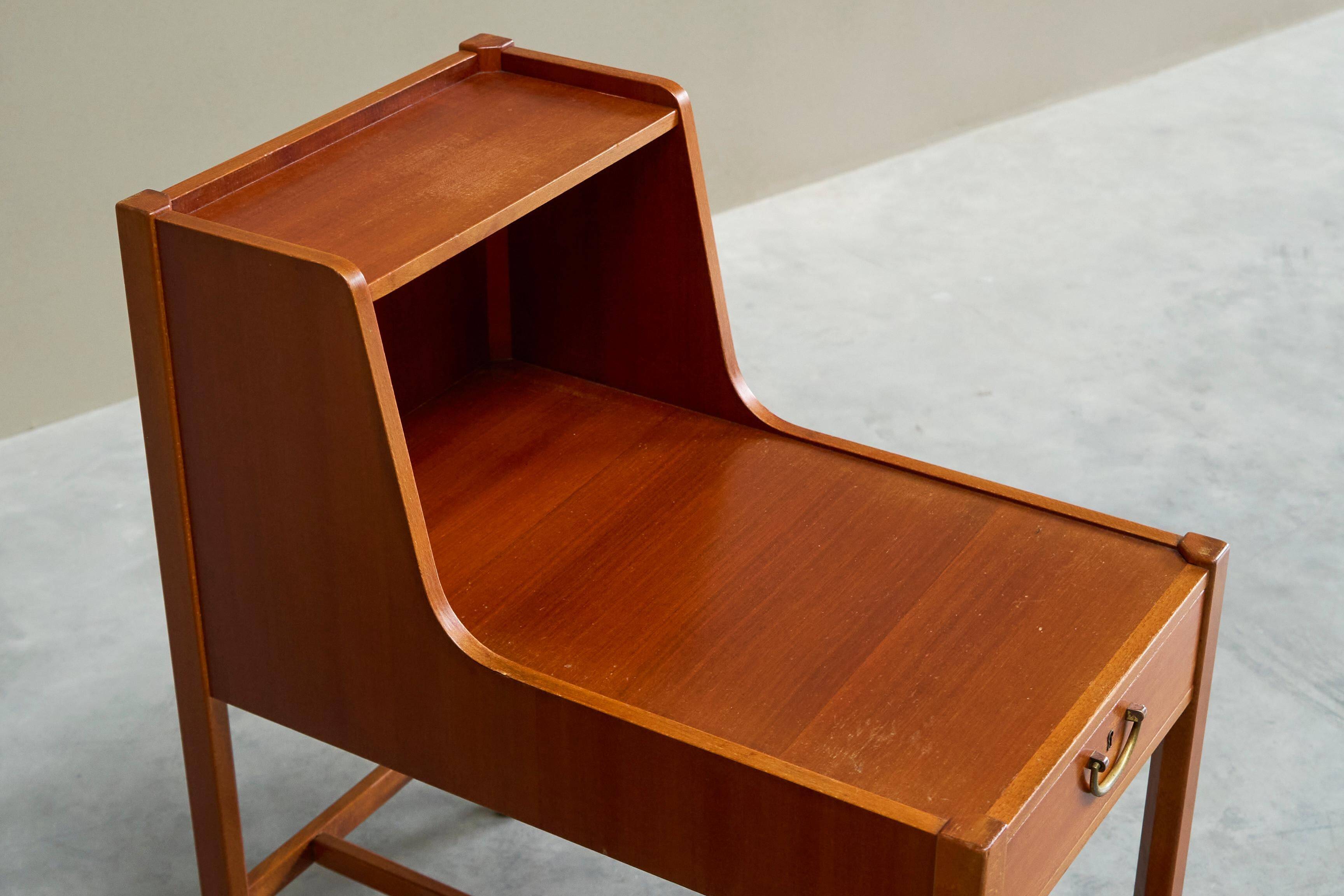 Pair of bedside tables by Nordiska Kompaniet in teak, 1952, by David Rosén.