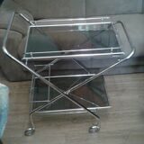 Chrome and smoked glass serving in the year 70