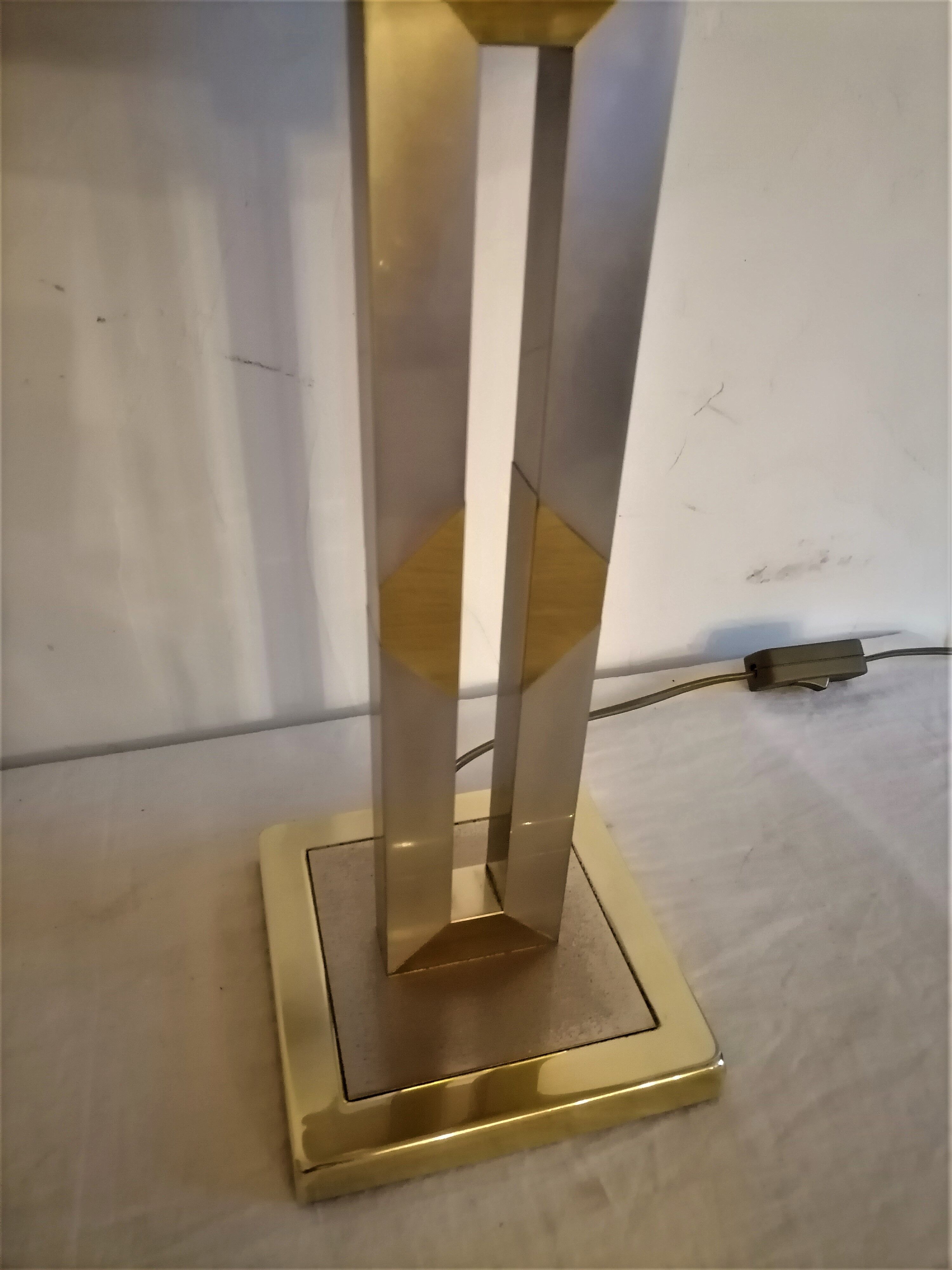 Modernist lamp. Brushed steel and brass.