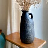Black ceramic pitcher from the 50s