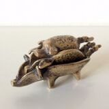 Stackable ashtrays in the shape of a pig