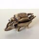 Stackable ashtrays in the shape of a pig