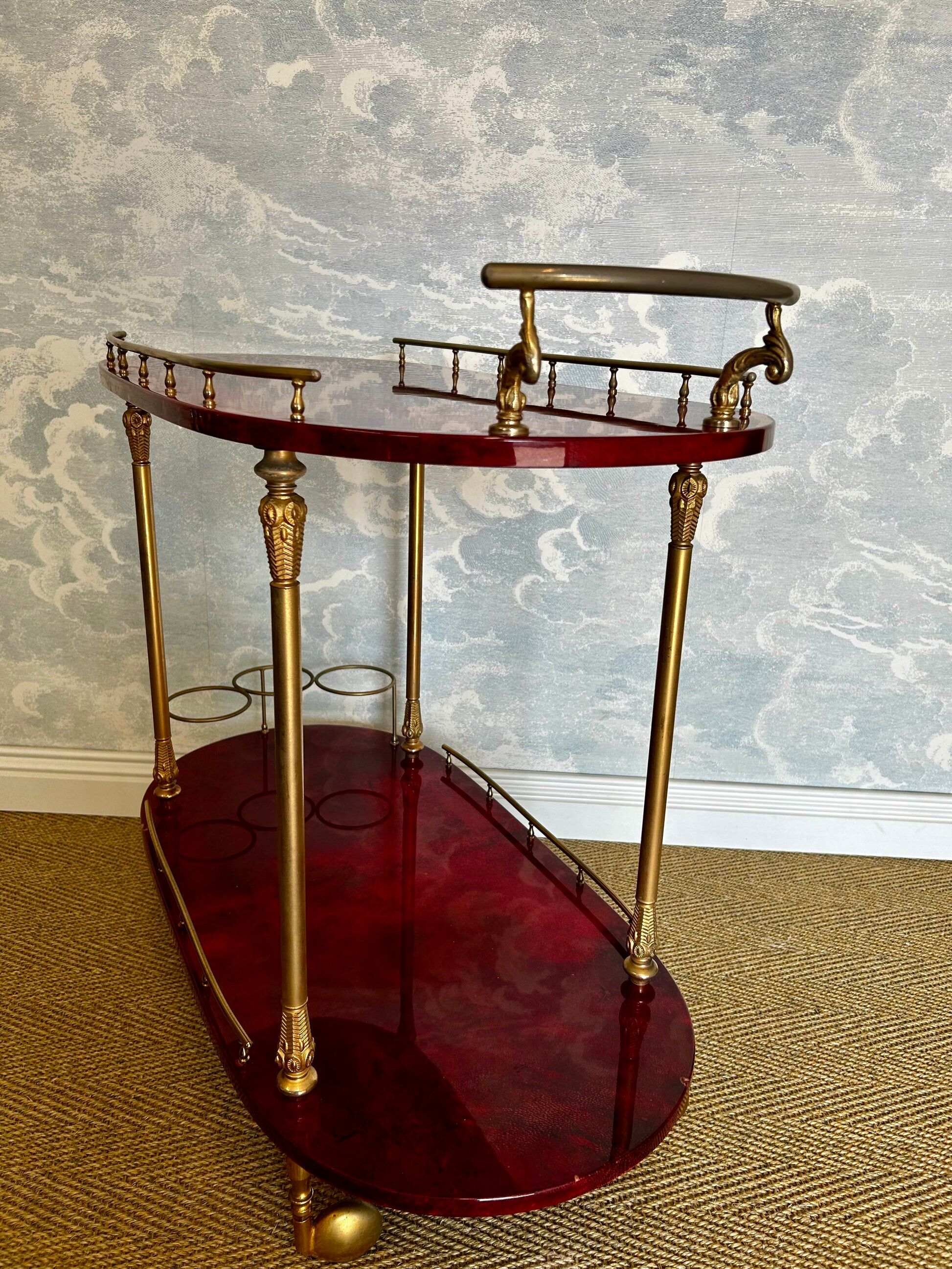 Cherry-red bar cart by Aldo Tura, Italy, 1960s, Hollywood Regency