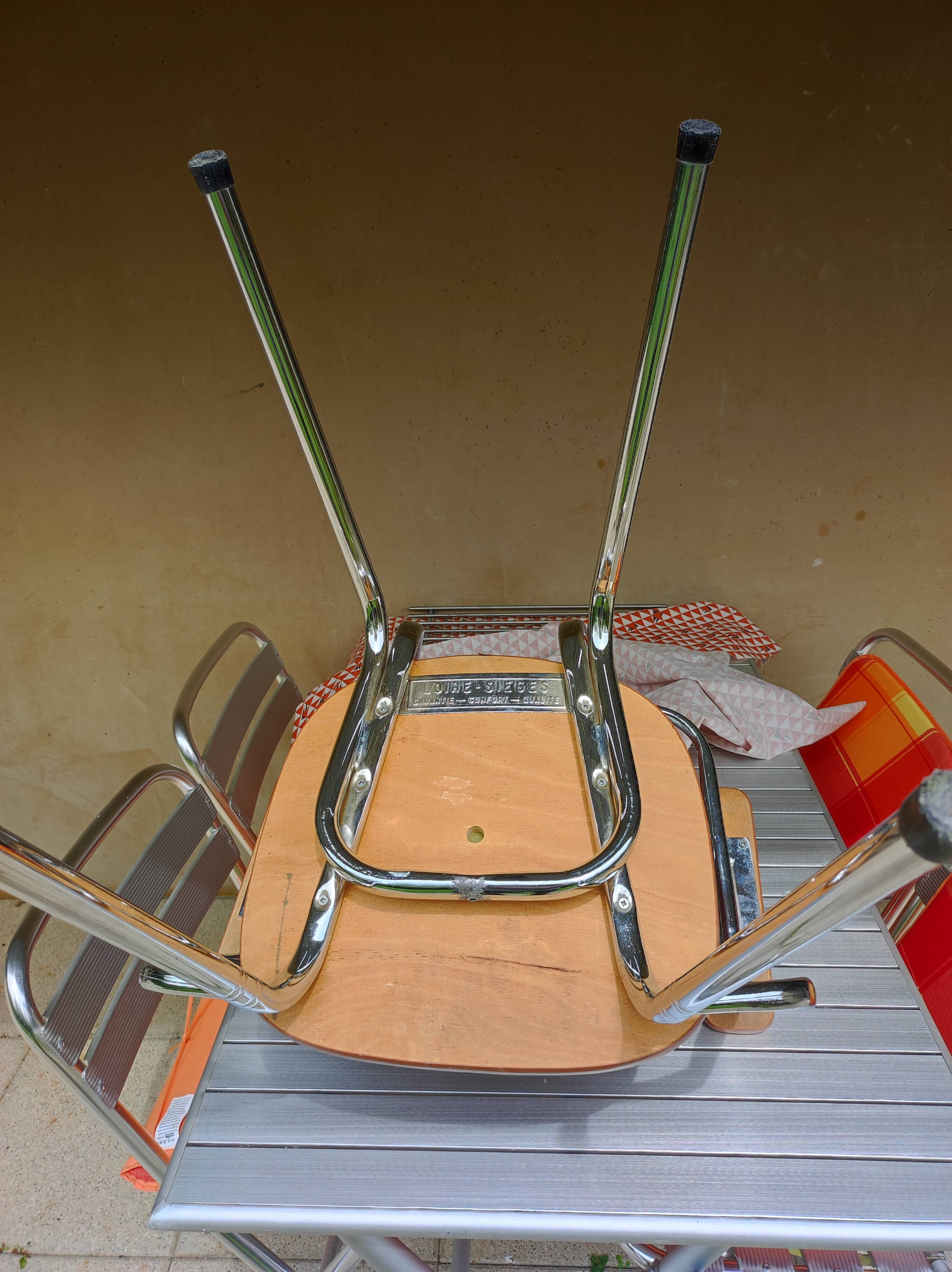 Stainless steel skaï armrest chair from 1958