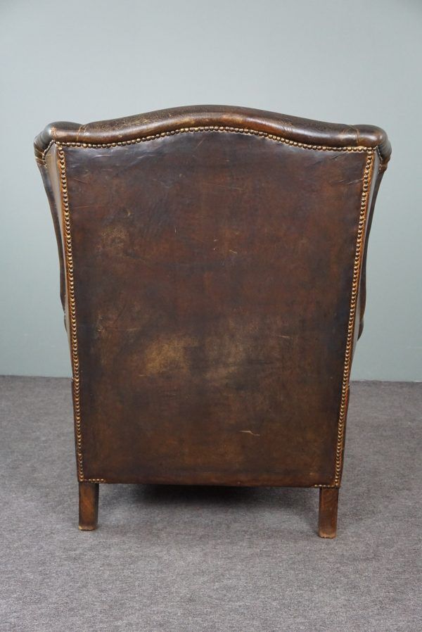 Patinated sheepskin armchair