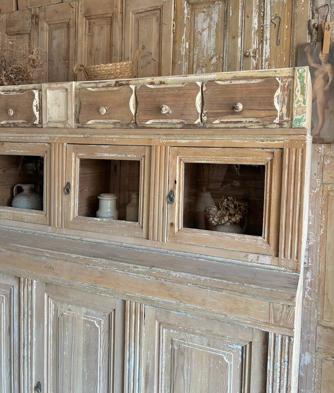 Old wooden grocery store cabinet, display cases and drawers