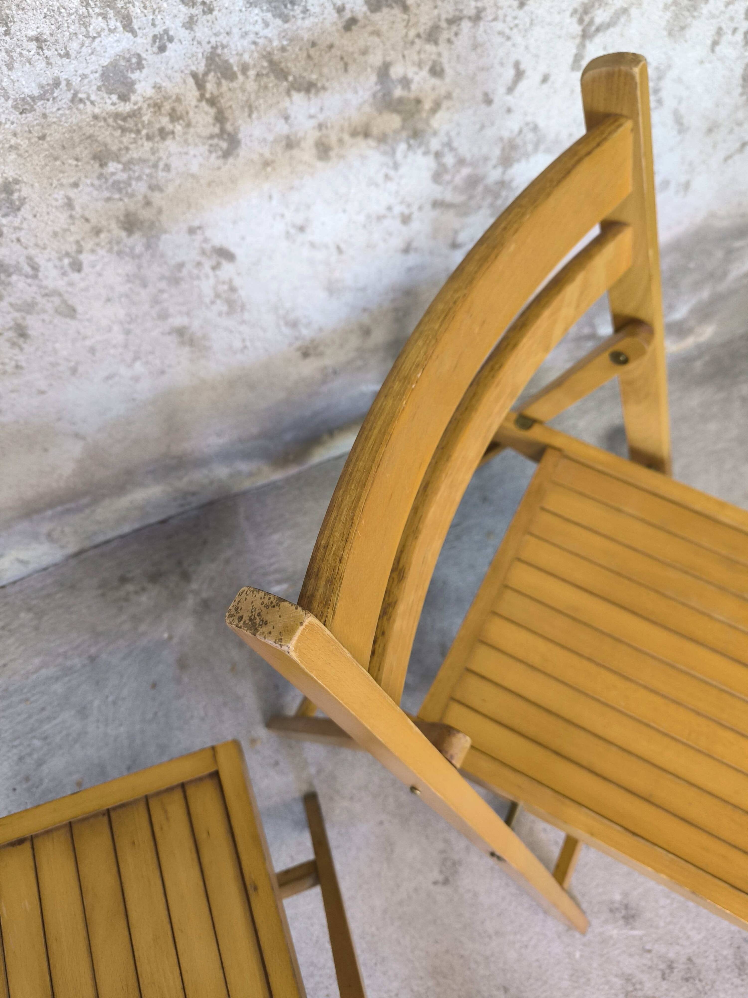 Pair of vintage folding wooden chairs