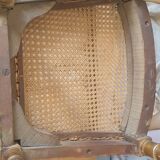 Pair of Louis XVI caned chairs with carved gilded wood.