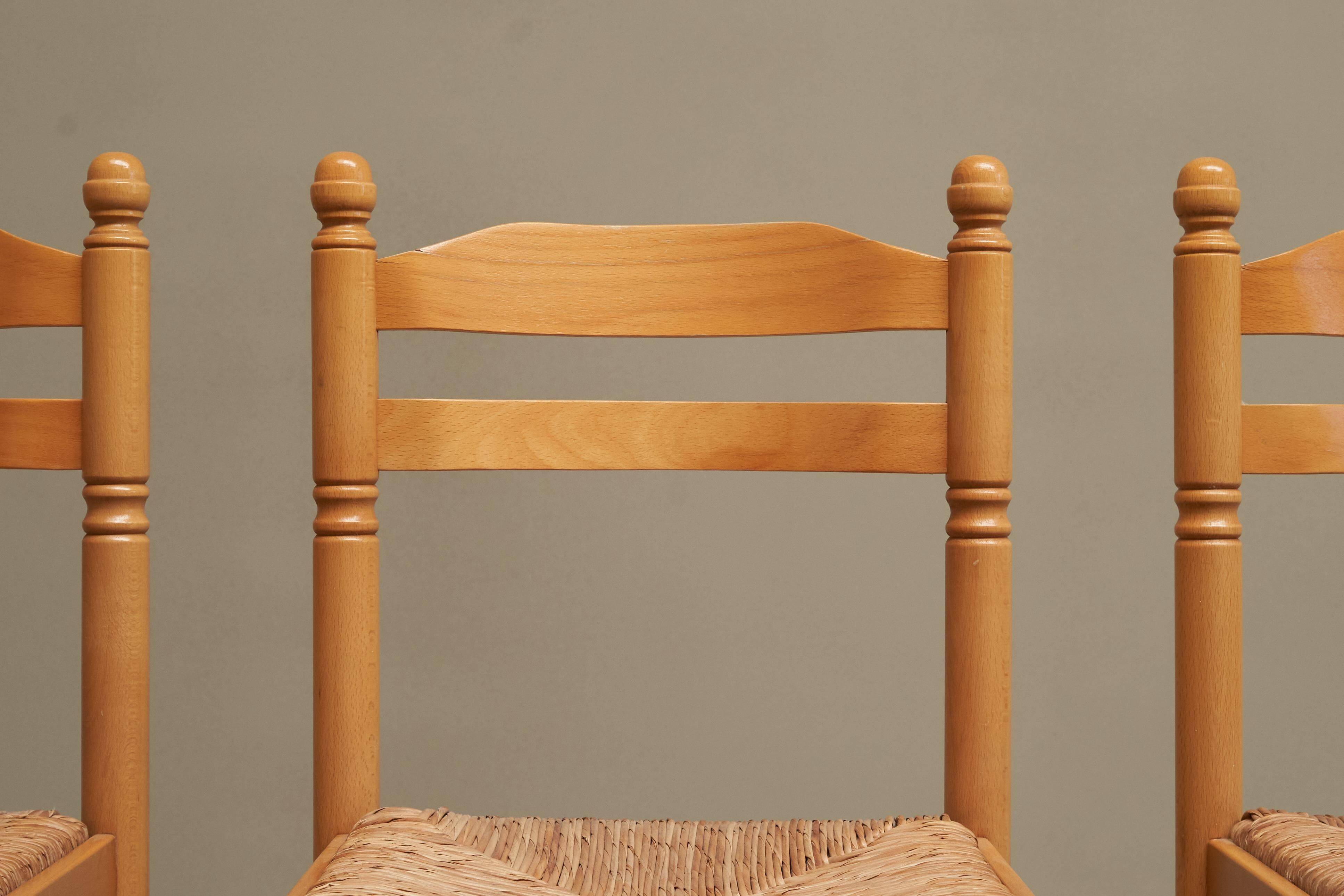 Set of 4 Mid Century beech dining chairs from the 1970s.