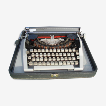 Typewriter in very good condition revised japy inter with his satchel