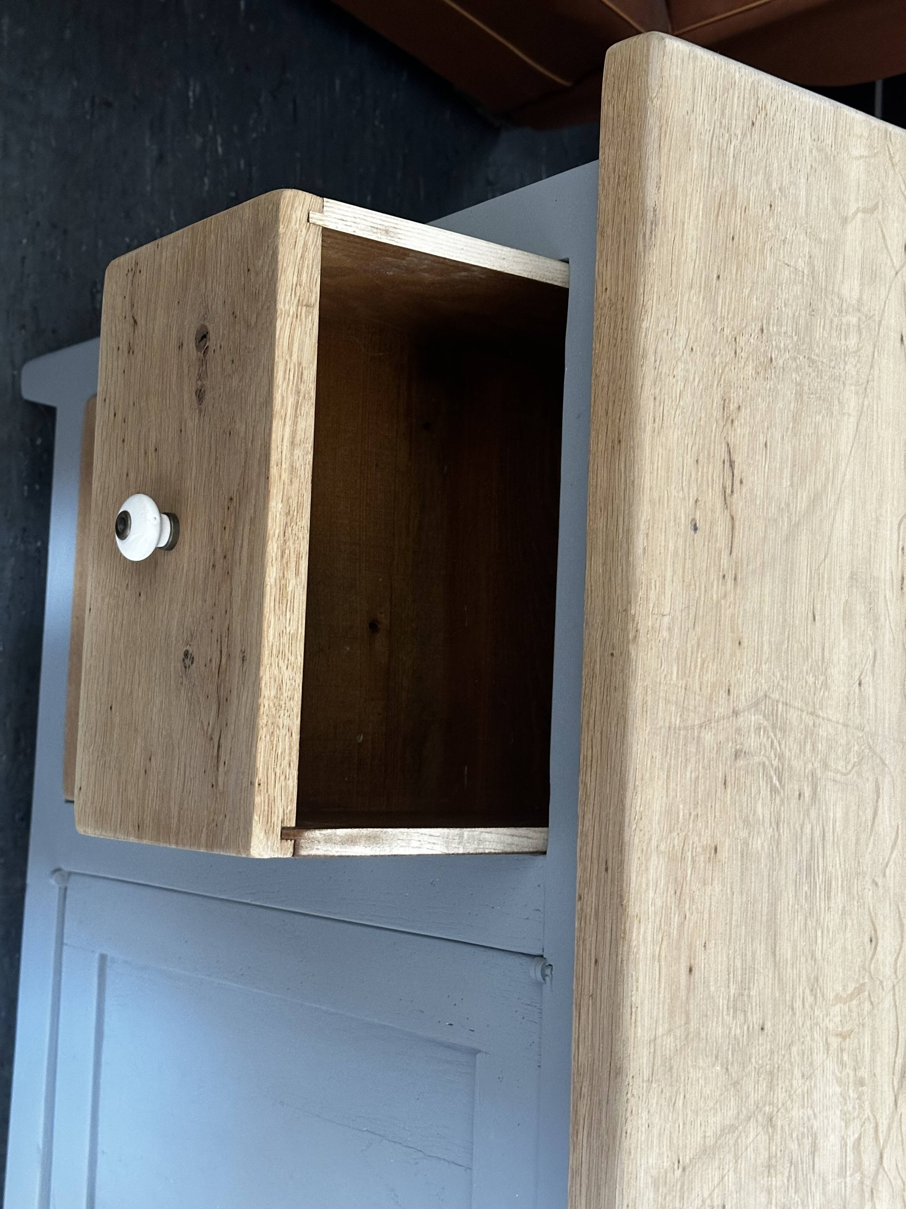 Vintage sideboard painted in gray and raw wood