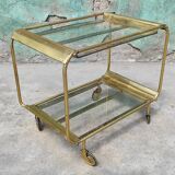 Old rolling coffee table serving vintage brass bar 50s mid-century design