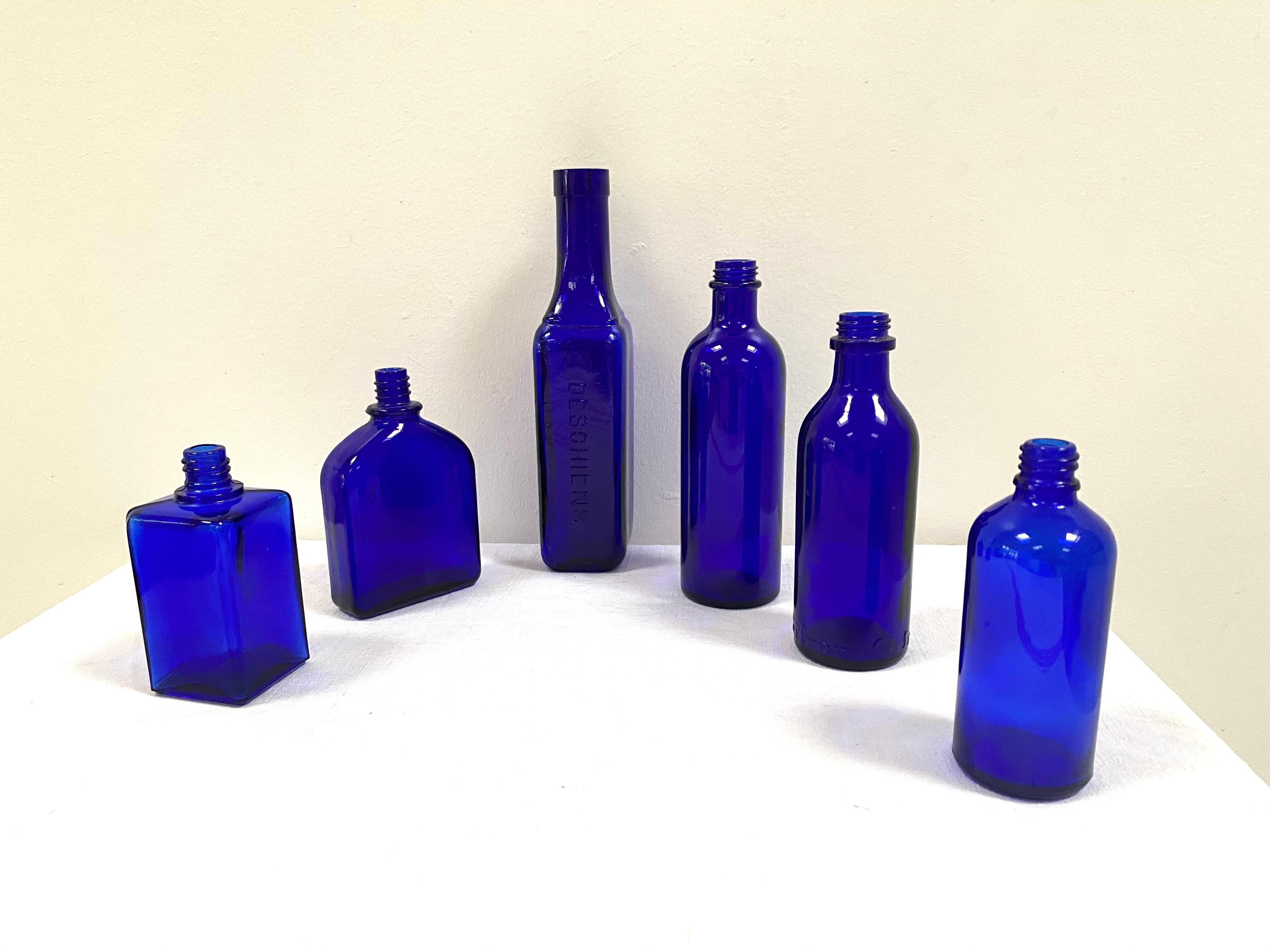 Set of 6 cobalt blue glass pharmacy bottles