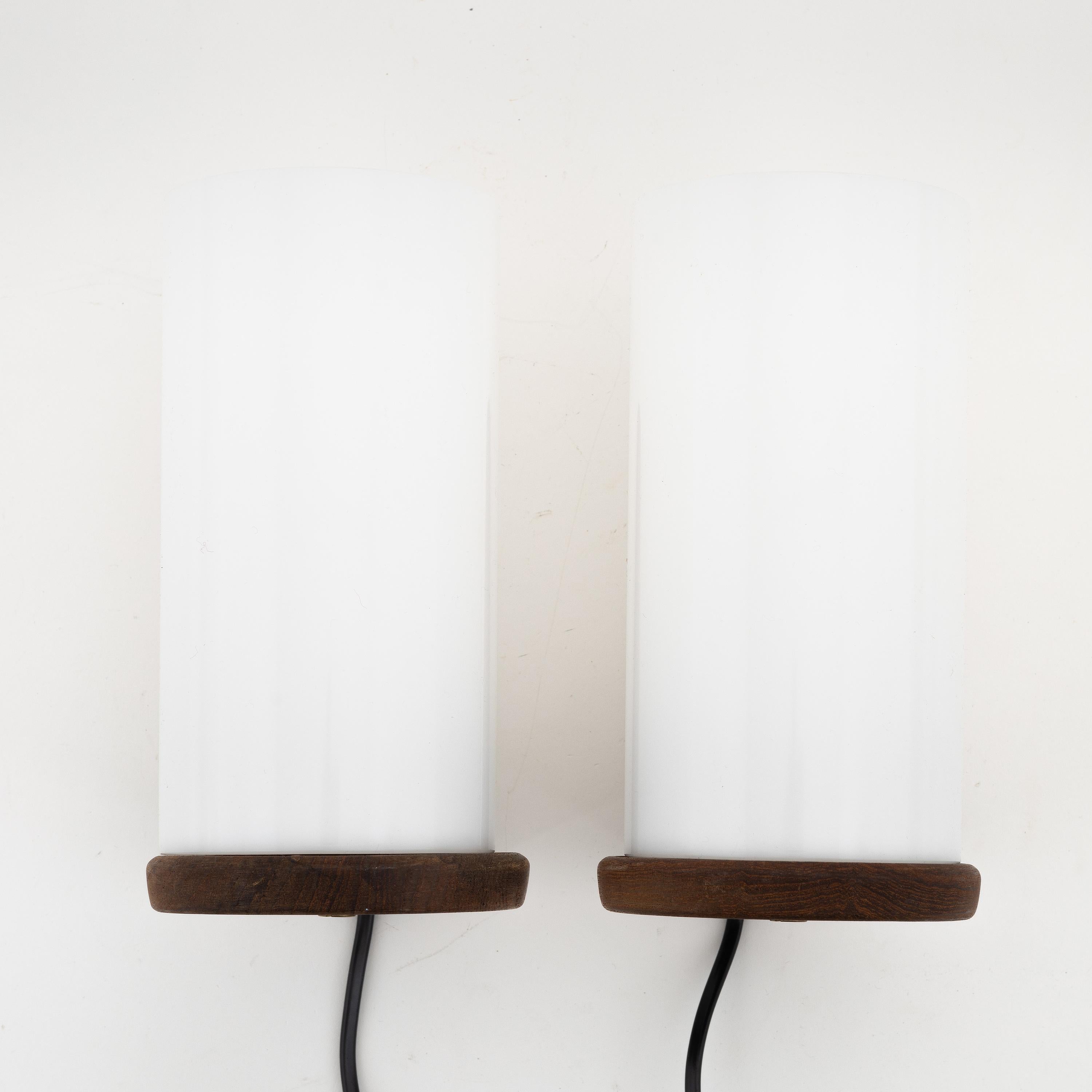 Uno & Östen Kristiansson 2 teak wall lights for Luxus Sweden 1960