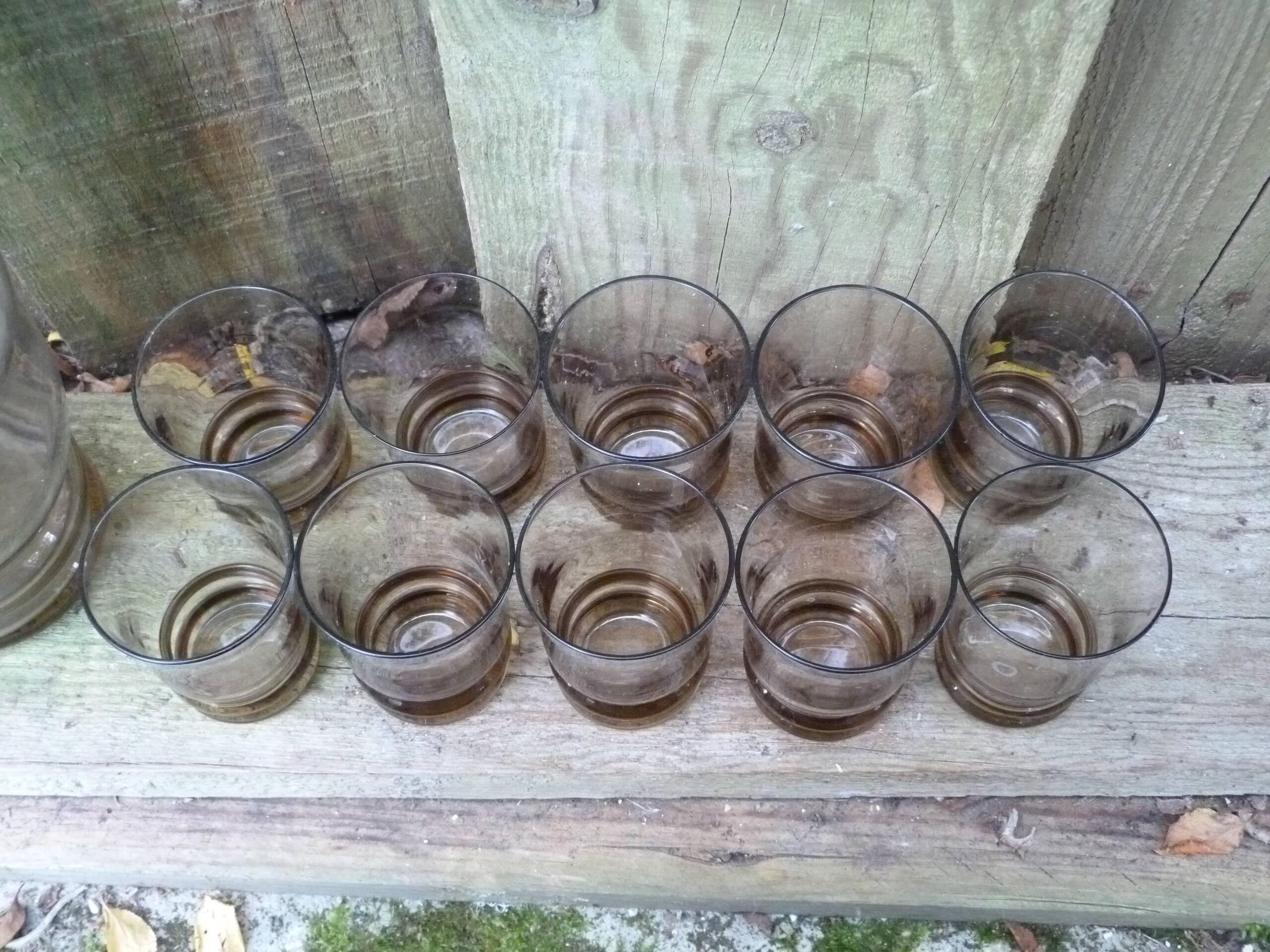 Set of 10 brown glasses and a carafe made in Belgium