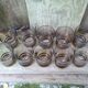 Set of 10 brown glasses and a carafe made in Belgium