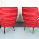 Mid-century modern pair of red armchairs. italy 1950s
