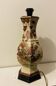 Vintage Asian lamp in ceramic with a wooden base, adjustable lampshade.