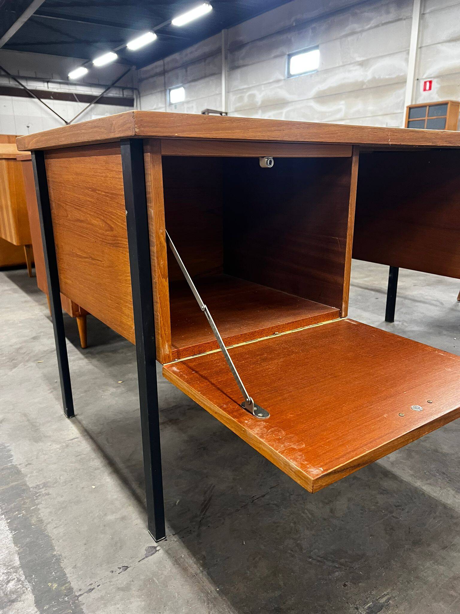 Vintage wooden desk with black steel frame