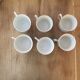 6 antique cups and mismatched saucers