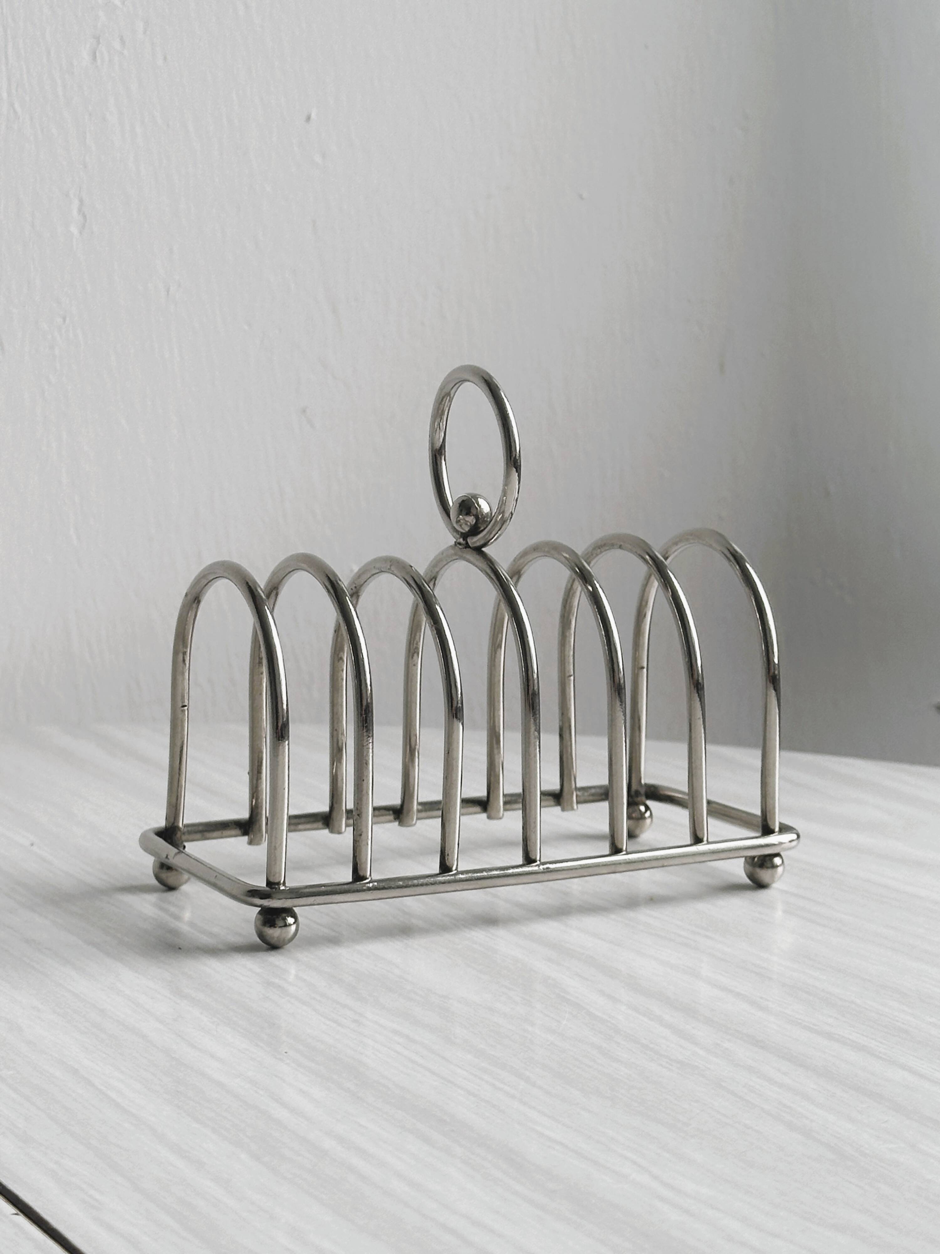 Stainless steel toast rack.