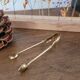 Golden metal sugar tongs