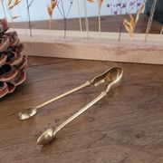 Golden metal sugar tongs