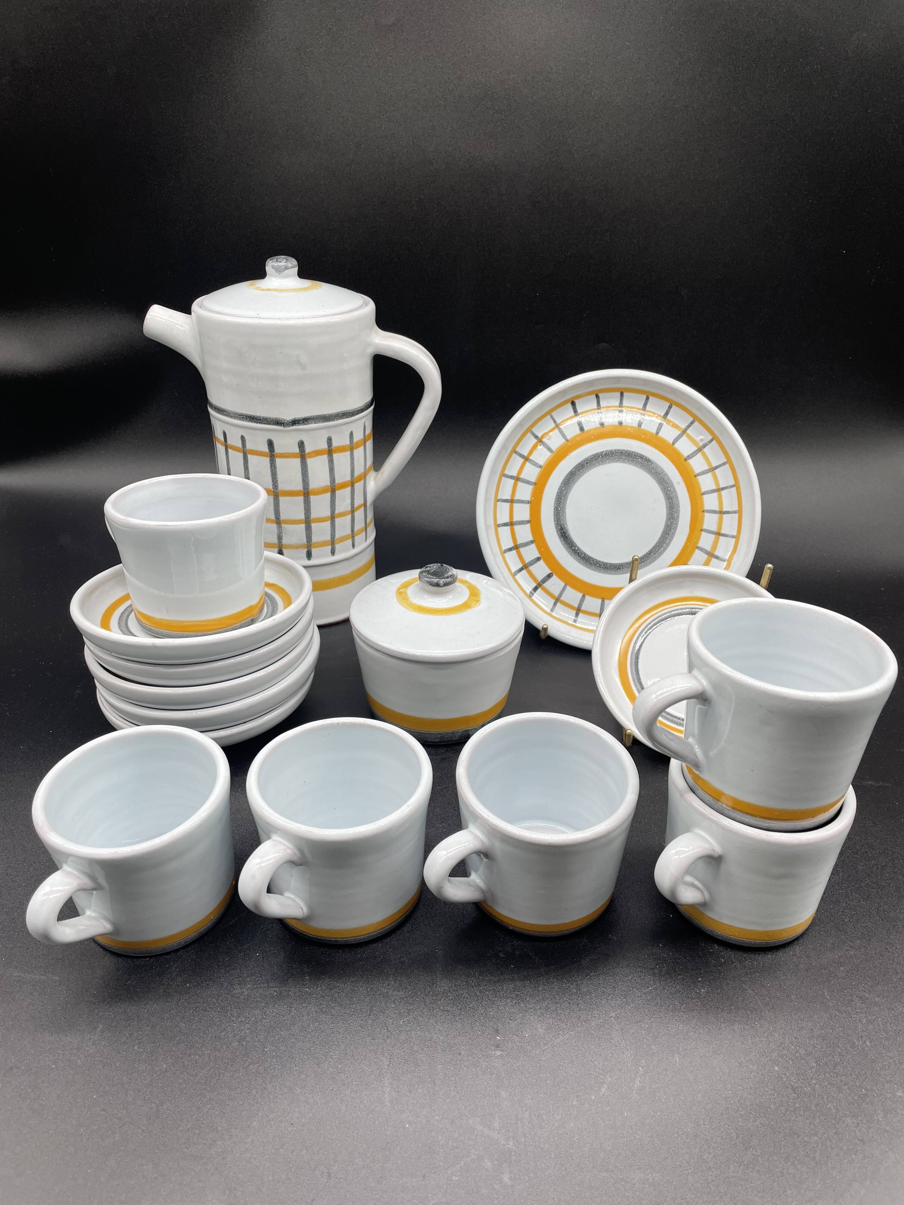 Vintage 1960s coffee service in ceramic, modernist design.