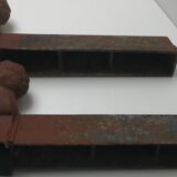 Pair of cast iron fireplace chenets "children"