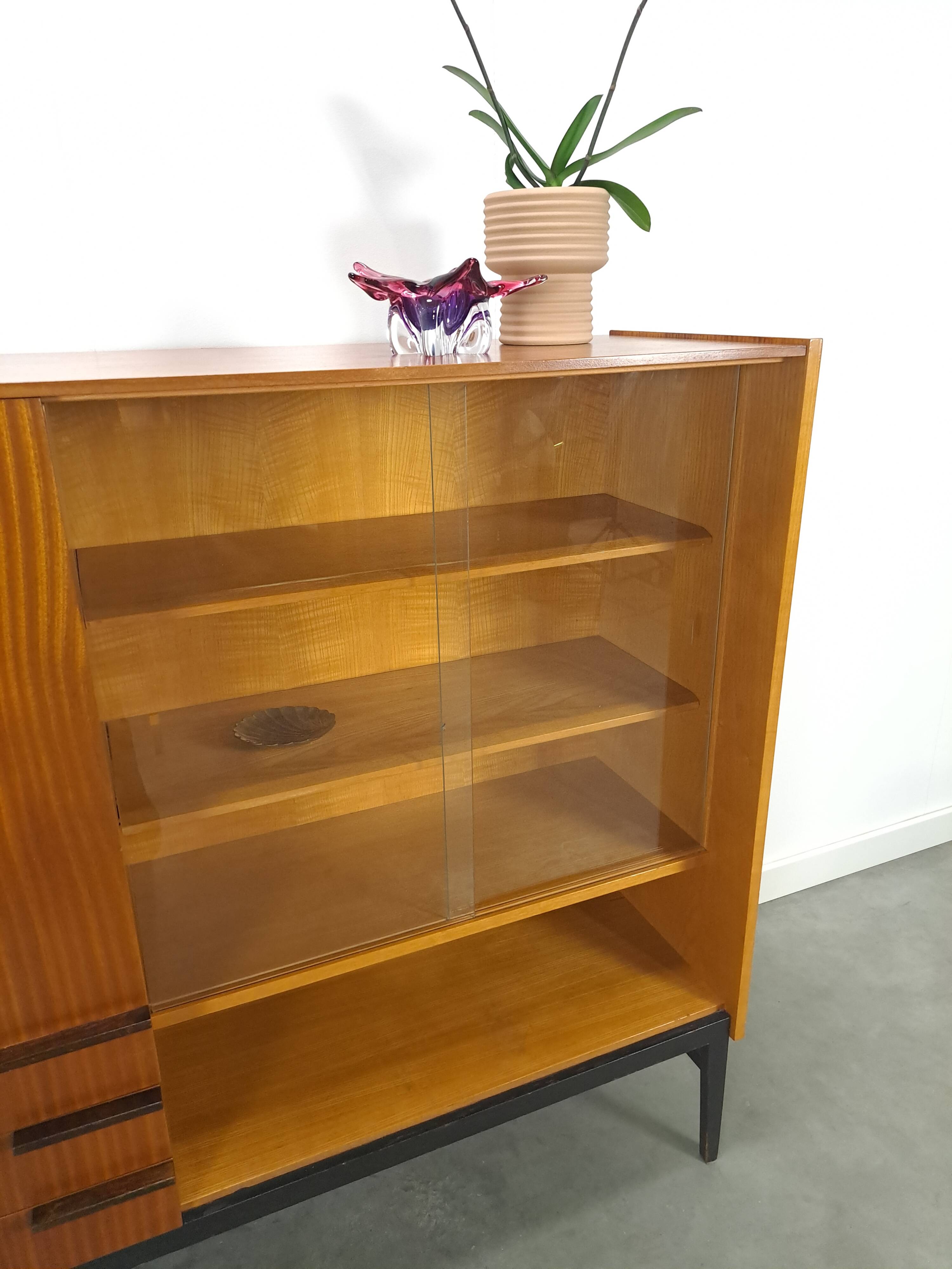 Design Mezulanik showcase with shelves