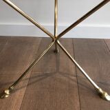 Round coffee table of neoclassical style in brass