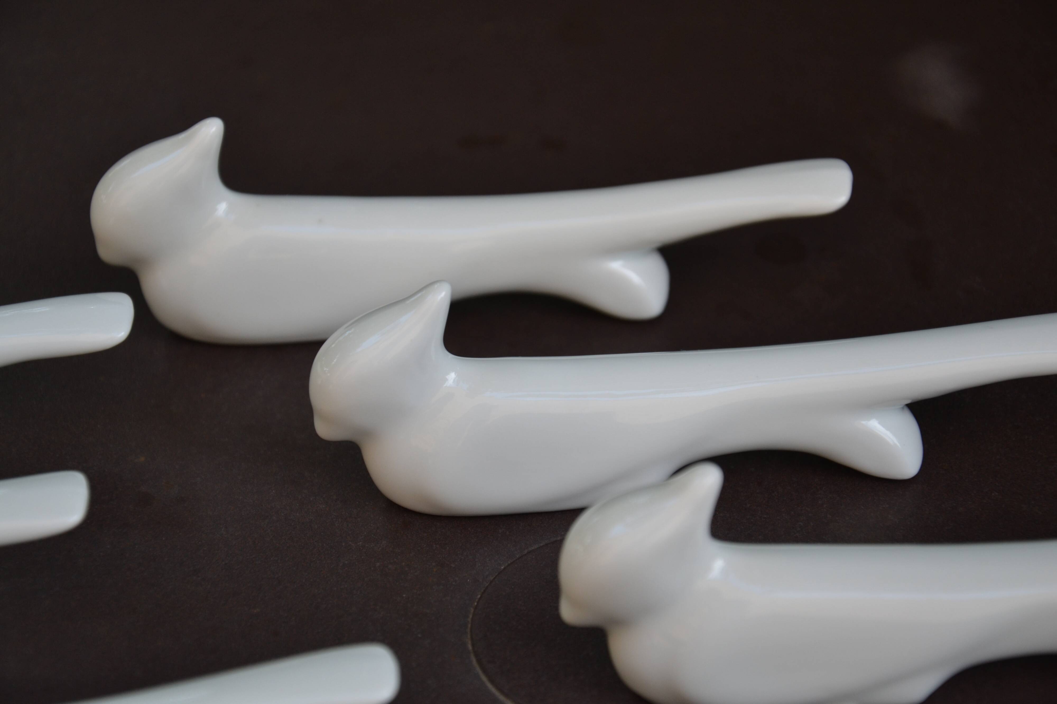 10 ceramic "bird" knife rests