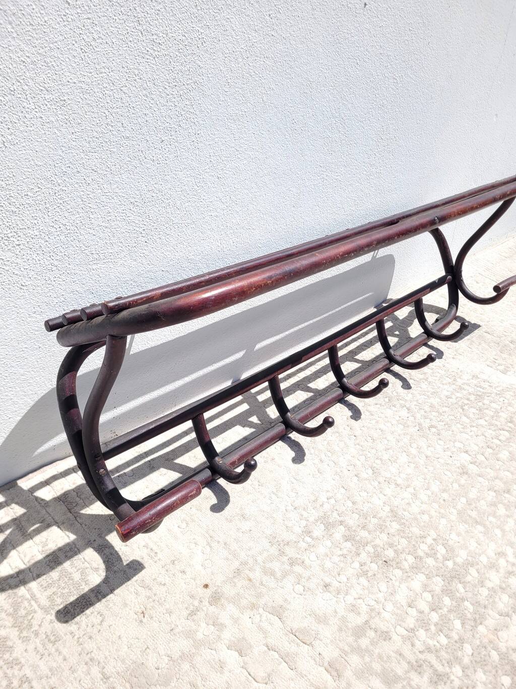 Old wooden cloakroom coat rack
