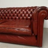 Old red leather Chesterfield sofa